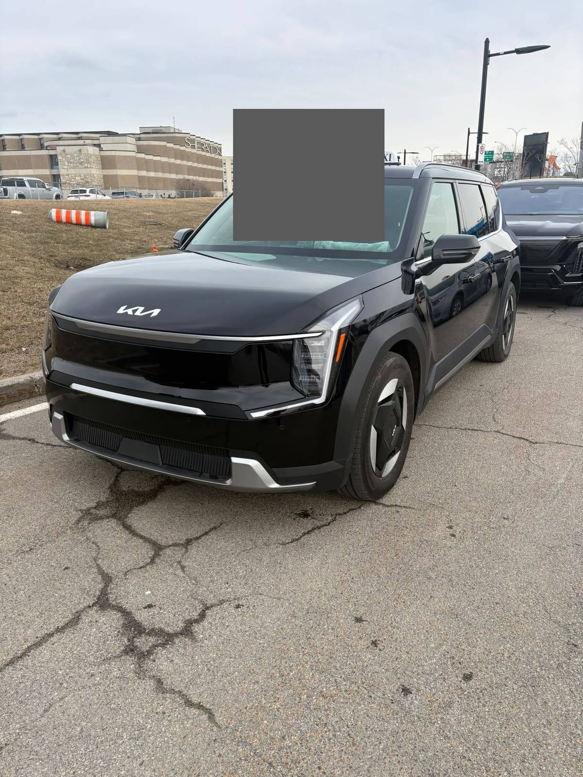Black Kia EV9 electric SUV, part of the US Limo and Taxi fleet