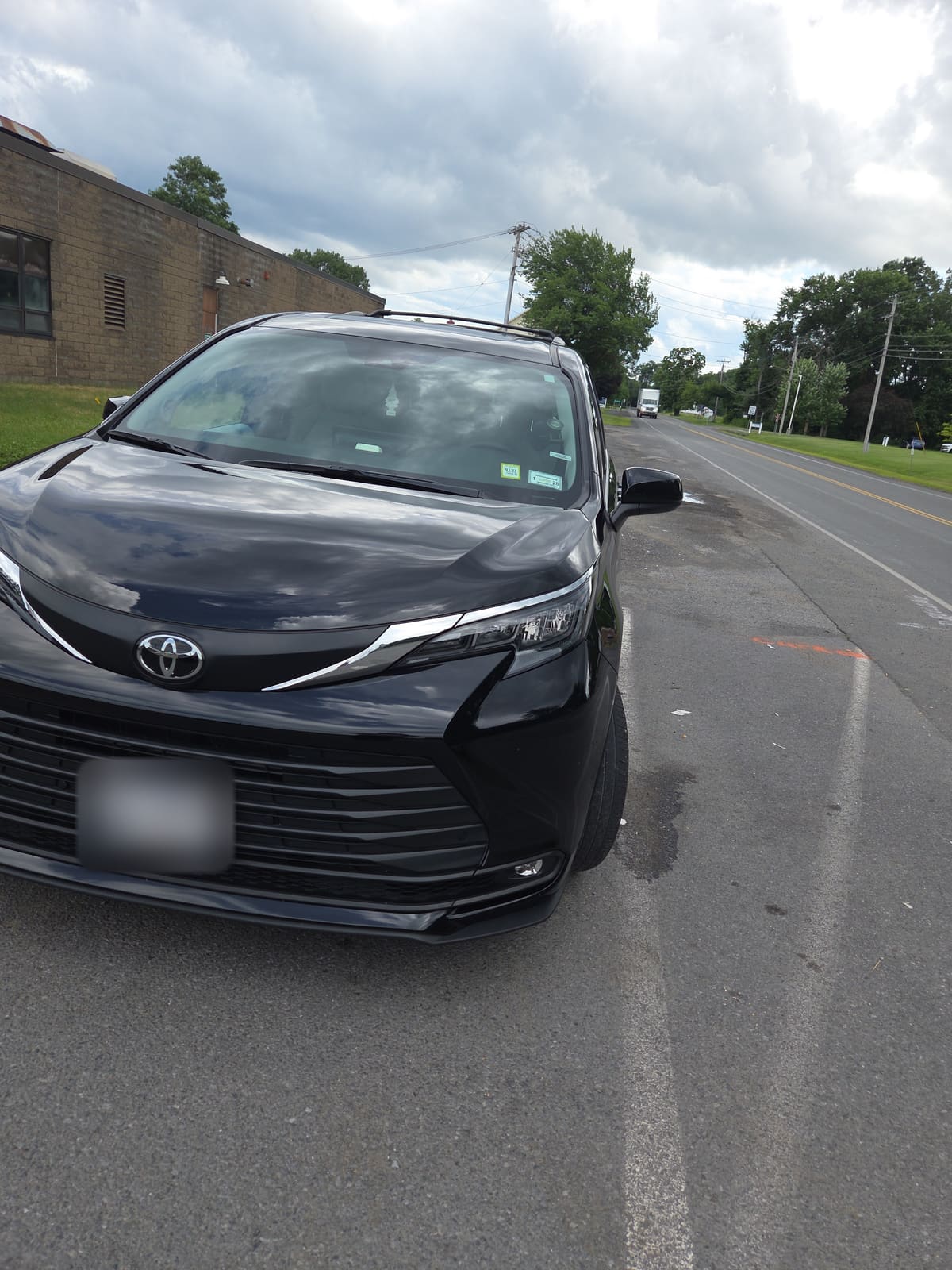 Black Toyota Sienna minivan, part of the US Limo and Taxi fleet